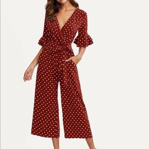Red polka dot flowy side tie jumpsuit